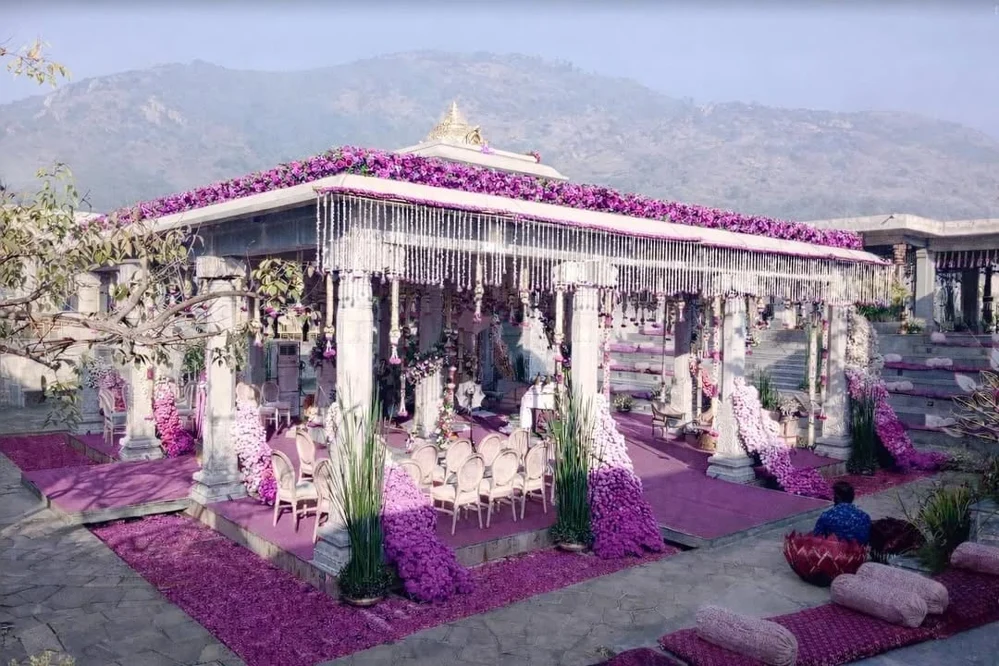 Pink floral mandap at Amita Rasa — completed Panigrahana work