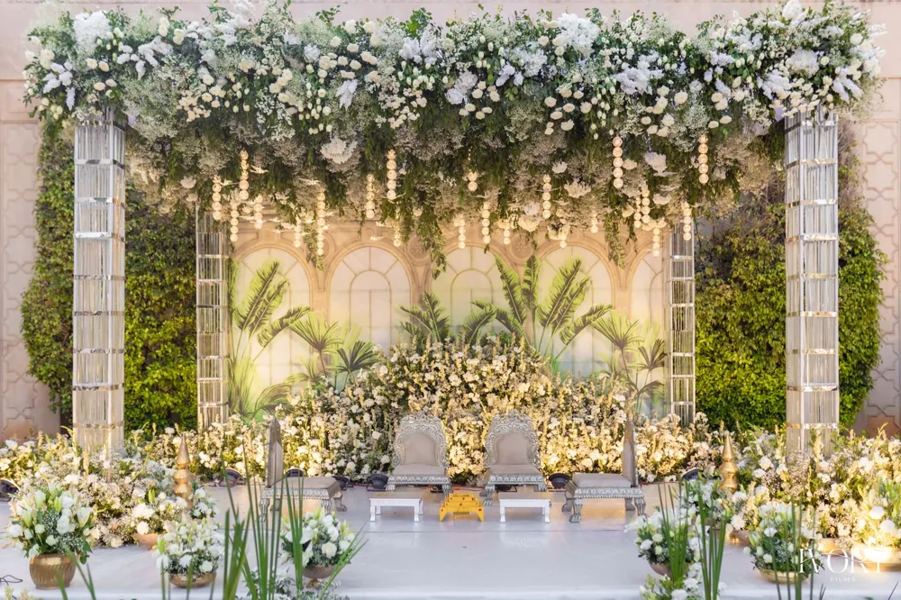 Ivory floral canopy with hanging garlands — Panigrahana decor portfolio