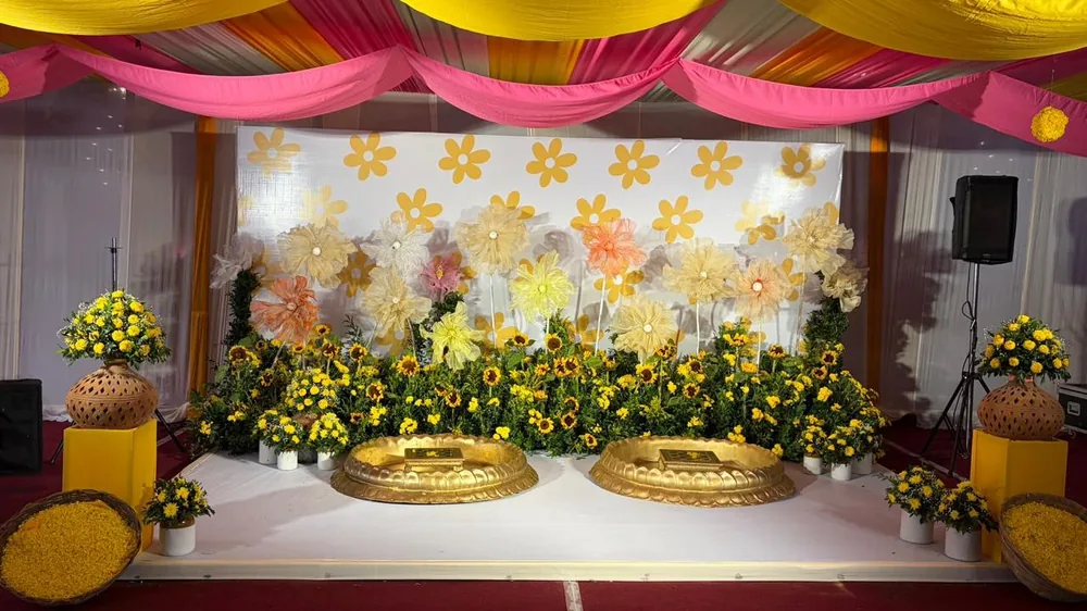 Yellow floral haldi stage in Thiruvannamalai