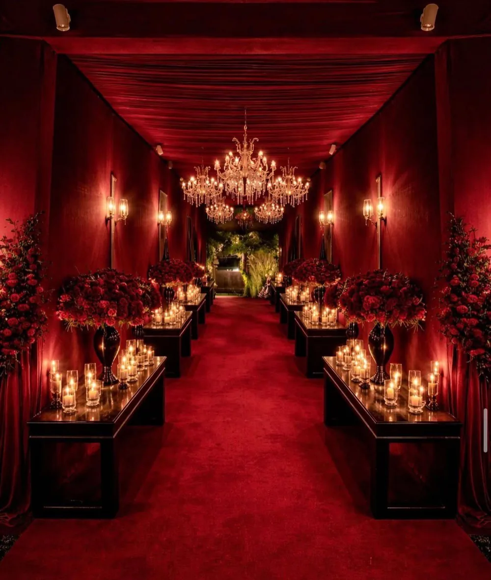 Red velvet corridor chandeliers candles — completed Panigrahana work