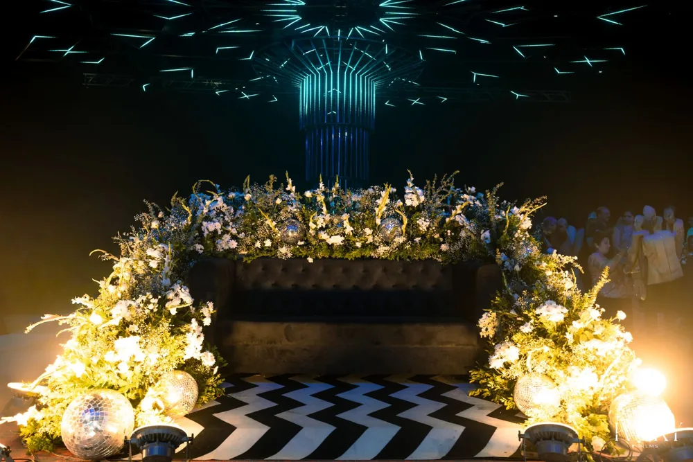 Sangeet stage floral checkerboard — completed Panigrahana work