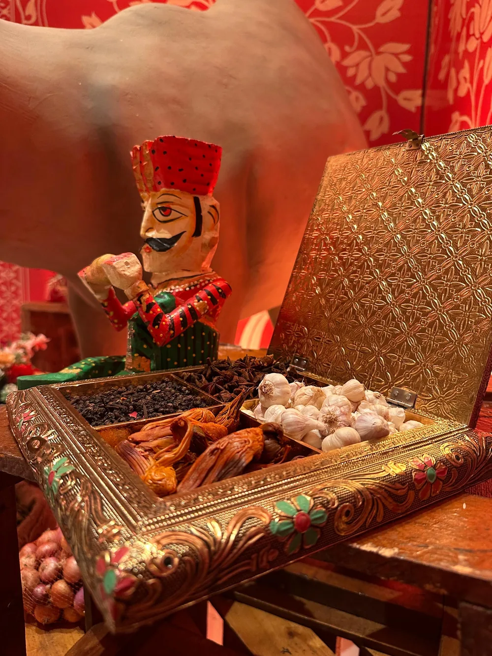 Decorative tray and miniature figures at the Sufi Night entrance at The St. Regis Goa Resort — Panigrahana decor portfolio